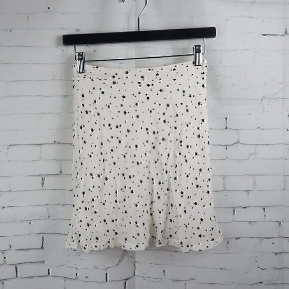 Altar'd State Dresses & Skirts - ALTAR'D STATE WHITE WITH BLACK STARS MINI TULIPSKIRT SIZE SMALL